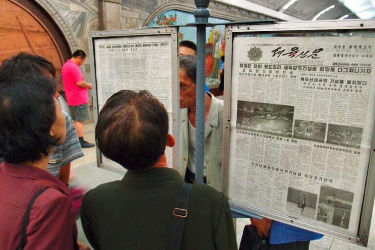 Public News Paper Stand in Pyongyang metro, North Korea.